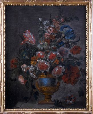 painting of a vase of flowers on a table in a gold frame