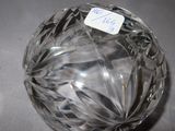 a small crystal ball with a sticker on it