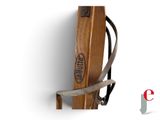 a wooden sled with a handle attached to it