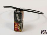 an image of a lighter that is made out of tin cans