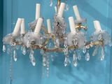 a chandelier hanging from the ceiling in a room