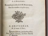 an open book on a white surface with the title of a poem