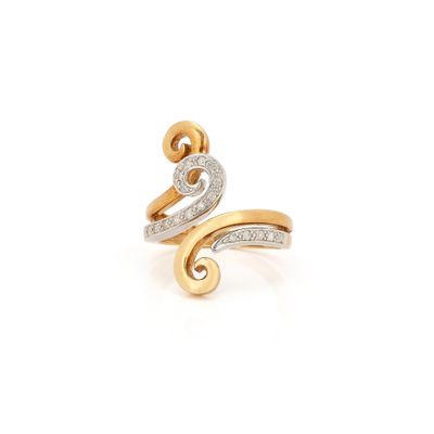 an image of a gold and white diamond ring