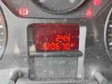 a digital clock on the dashboard of a car