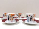 three coffee cups and saucers with pictures of people on them
