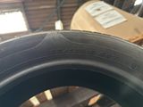 a tire that is on the ground in a garage