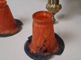 two candles that are sitting on a table