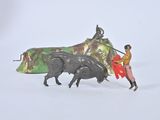 toy figurines of a man riding a bull and a woman on a horse