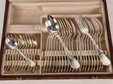 silverware in a wooden box with silverware in it