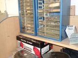 a picture of a workbench with two circular saws on top of it