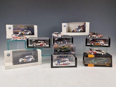 many different models of cars in a display case