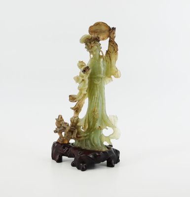 chinese carved jade figurine of a lady with a basket of flowers