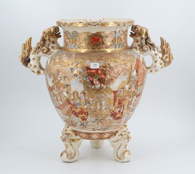 a vase that is sitting on a stand on a white surface