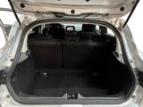 a trunk of a car with a tv in the back