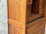 an image of a wooden cabinet with a drawer on top of it