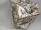 a white box with a floral design on it