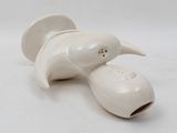 a white object that is sitting on a white surface