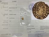 une image d'un document sur lequel figure l'image d'une pièce de monnaie