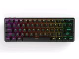 a computer keyboard that is sitting on a white surface