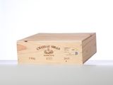 a wooden box with a wine bottle inside of it