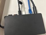 a black box with wires attached to it sitting on a desk
