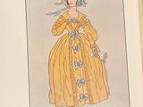 an open book with a drawing of a woman in a yellow dress