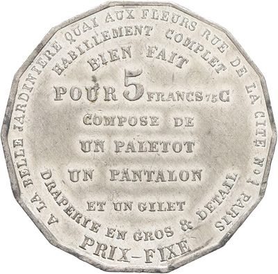 une vieille pièce d'argent avec une inscription sur un fond blanc
