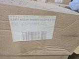 packaging of a box with a sticker on it sitting on top of a table