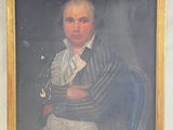 portrait of a man in a blue coat and white shirt with a black shawl around his neck