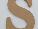 the letter s is made out of cardboard and sits on a white surface