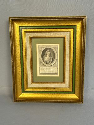 an old picture of a man in a gold frame with a green border
