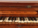 a piano that is sitting on top of a table