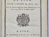 un livre ouvert sur lequel figure un blason