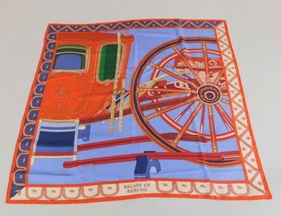 orange and blue scarf with a horse drawn carriage on it