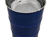 a blue barrel that has a grill inside of it