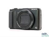 a camera that is sitting on a white surface