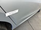 a picture of a car with a sticker on the side of it