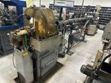 une image représentant une machine dans une usine où se trouvent de nombreuses machines