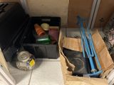 a box with a bunch of items in it sitting on the floor