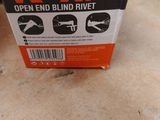 a box of wokin open end blind rivets on the floor