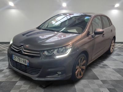 the grey citrole is parked on a checkered floor