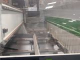 a picture of a conveyor belt in a factory