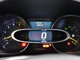 a close up of a car dashboard with a clock on it