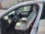 the interior of a car with the driver ' s seat up