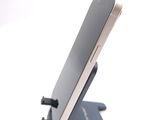a cell phone that is sitting on top of a stand
