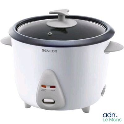 a white and black crock pot on a white background