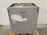 a large metal box sitting on top of a wooden pallet
