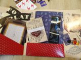 a table with a bunch of cards and other items on it