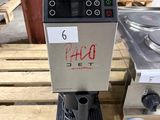 a coffee machine that is sitting on a pallet