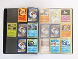 a lot of pokemon cards in a binder